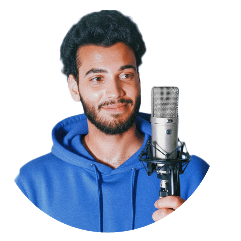 Standup Gaurav, a young content creator and comedian, smiling confidently with a microphone, symbolizing creativity and storytelling.